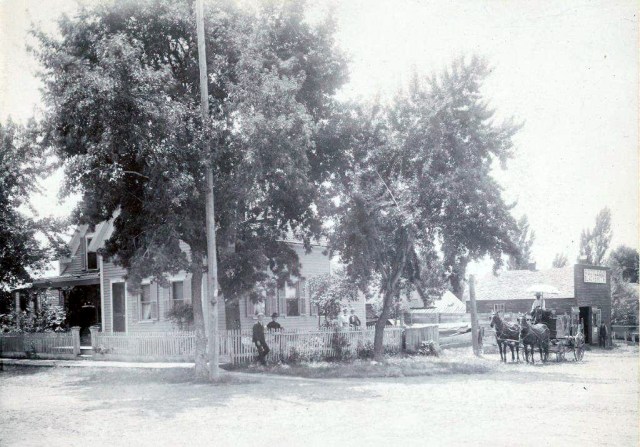 GD Coleman House and Blacksmith Shop, Anoka, MN 1900 far left-Ammi C. Coleman, Molly Woods Coleman, Lucy Coleman Russell, AH Russell, unknown man on wagon   Thank you to Chuck Russell